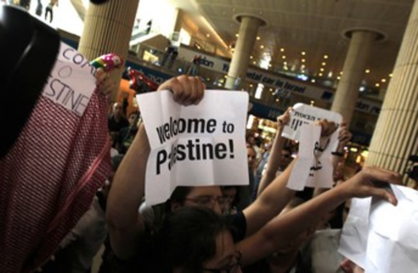 pro-Palestinian activists at Ben Gurion Airport 370 (photo credit: REUTERS)
