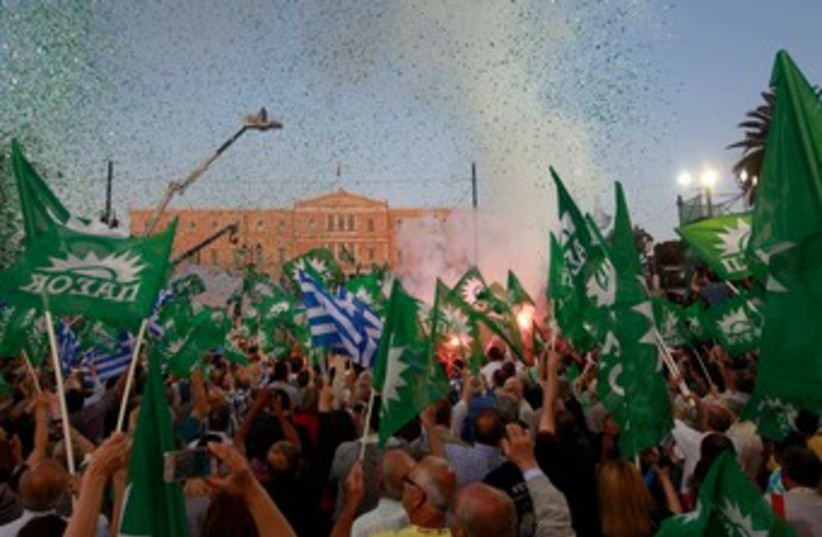 Rally for Greek Socialist (PASOK) 370 (photo credit: REUTERS/John Kolesidis )