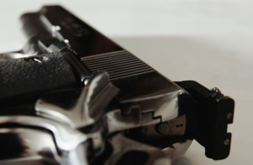 Handgun (illustrative) 370 (photo credit: Thinkstock/Imagebank)