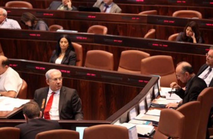 Netanyahu looks up in Knesset_370 (photo credit: Marc Israel Sellem/The Jerusalem Post)