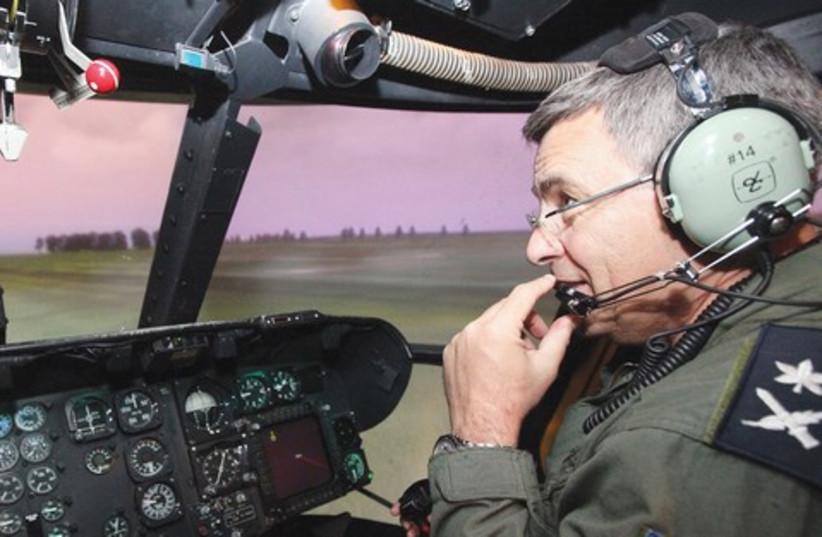 Ido Nehushtan in the cockpit of a Cobra attack helicopter  (photo credit: Marc Israel Sellem)