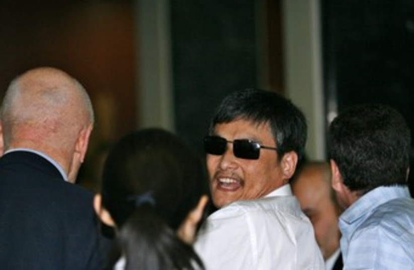 Blind Chinese activist Chen Guangcheng 370 (photo credit: REUTERS)