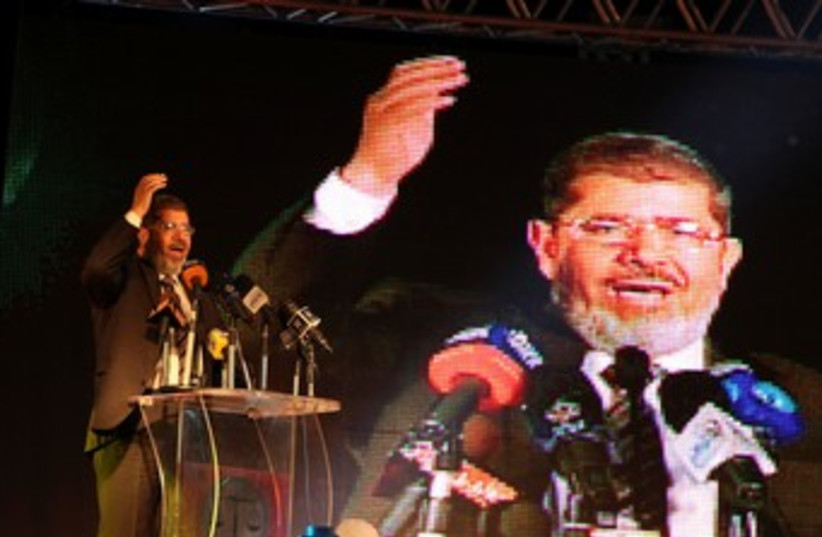 Muslim Brotherhood presidential candidate Mohamed Mursi 370  (photo credit: REUTERS/Mohamed Abd El Ghany)