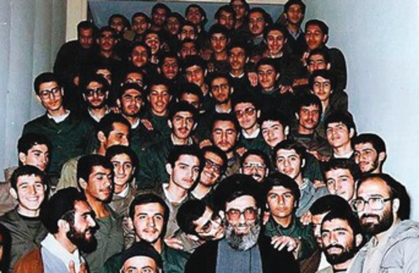 Revolutionary Guards member kisses Khamenei on cheek 370 (photo credit: REUTERS)