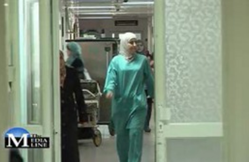 Woman doctor in Palestinian Al-Makassed Hospital 311 (photo credit: The Media Line)
