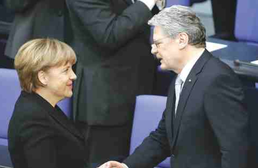 Angela Merkel et Joachim Gauck (photo credit: © Reuters)