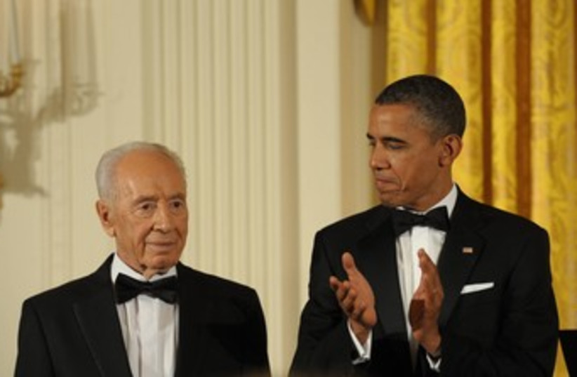 Peres and Obama 370 (photo credit: Amos Ben Gershom / GPO)