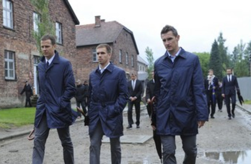 German soccer players at Auschwitz 370 (photo credit: REUTERS/POOL New)