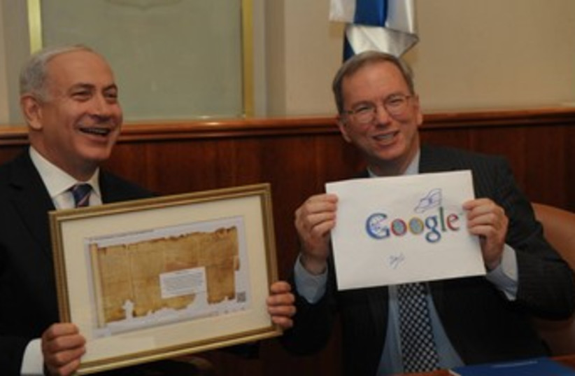 Netanyahu, Schmidt hold up Doodle, picture of Isaiah Scroll  (photo credit: PMO/Courtesy)