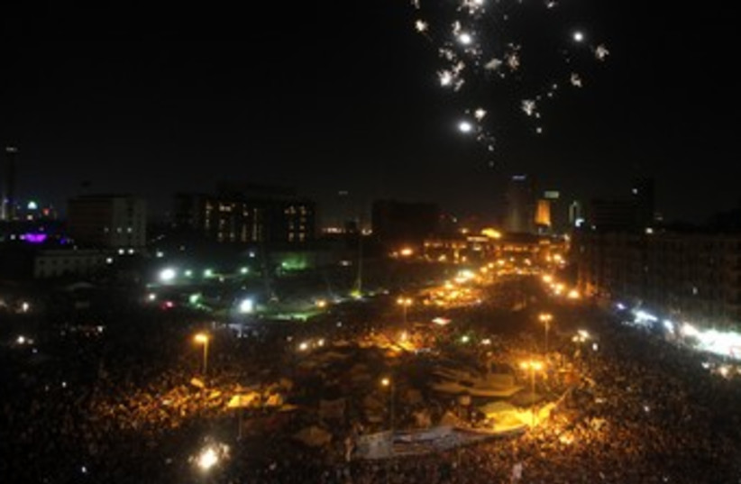 Morsy supporters demonstrate in Tahrir Square 370 (R) (photo credit: Asmaa Waguih / Reuters)