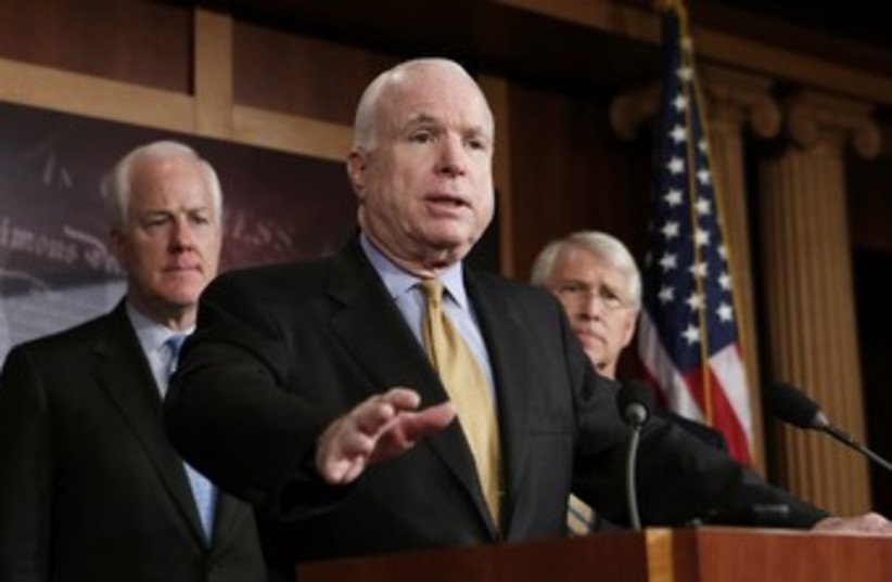 US Senator John McCain 370 (R) (photo credit: Kevin Lamarque / Reuters)
