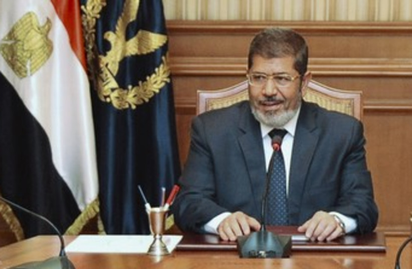 Egypt's president-elect Mohamed Mursi 370 (R) (photo credit: REUTERS / Handout)