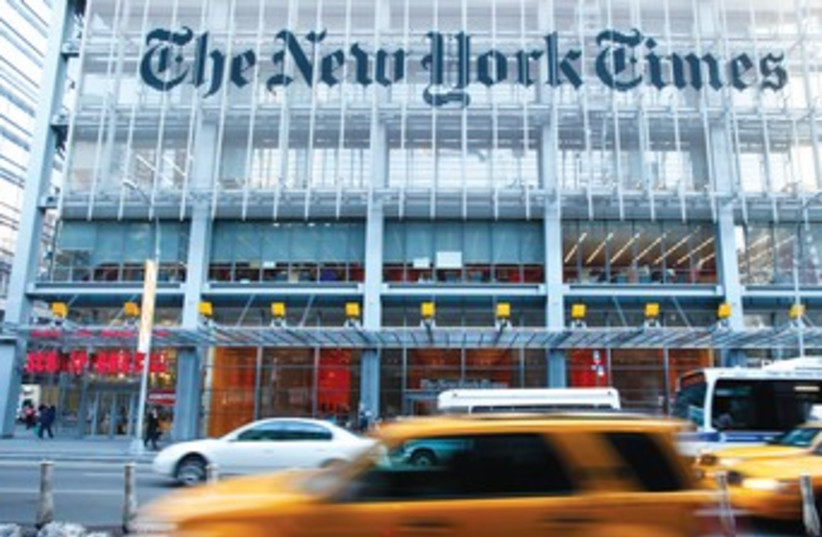 TRAFFIC SPEEDING by the New York Times building 370 (photo credit: Reuters)