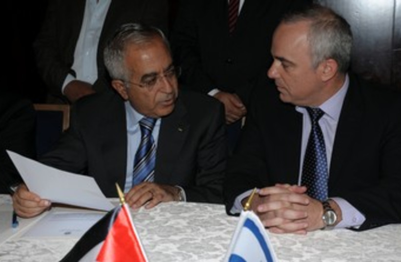 Finance Minister Steinitz and PA PM Fayyad 370 (photo credit: (Moshe Milner/GPO)