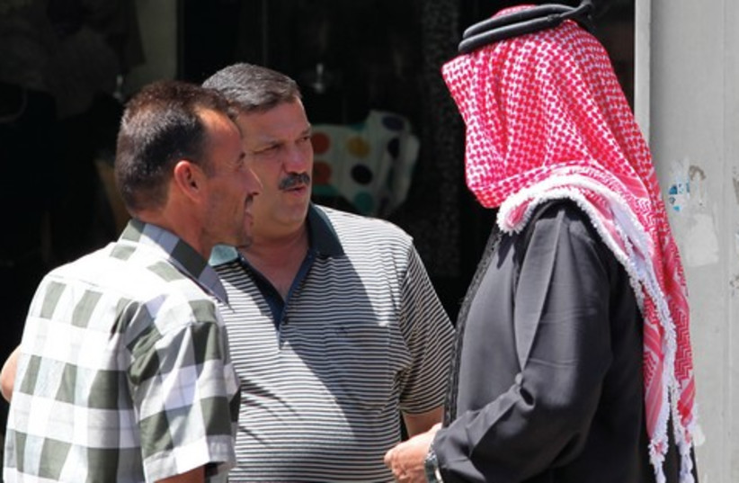 A group of Arab men talking 521 (photo credit: Marc Israel Sellem)