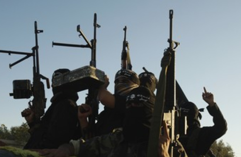Army of Islam terrorists in Gaza 370 (R) (photo credit: Ibraheem Abu Mustafa / Reuters)