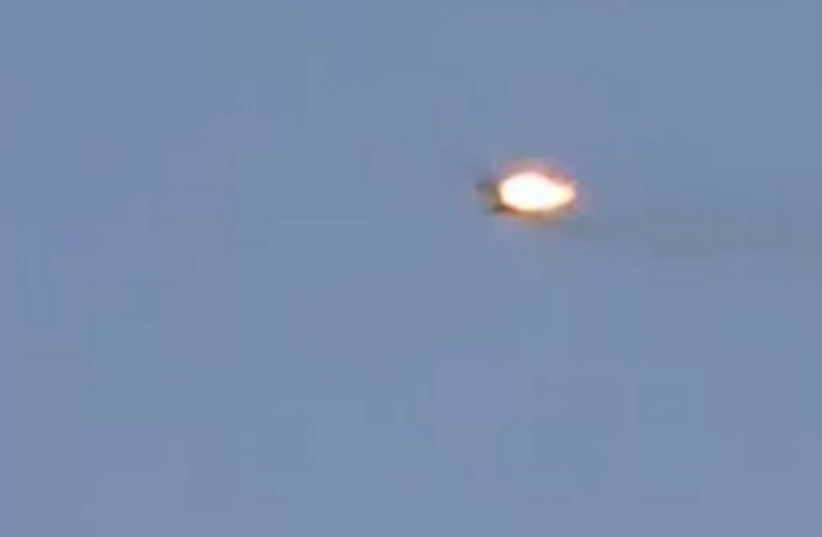Syrian war plane bursts into flames 370 (photo credit: YouTube Screenshot)