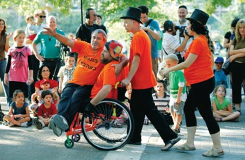 Disabilities wheelchair disabled 521 (photo credit: Moshe Shai)