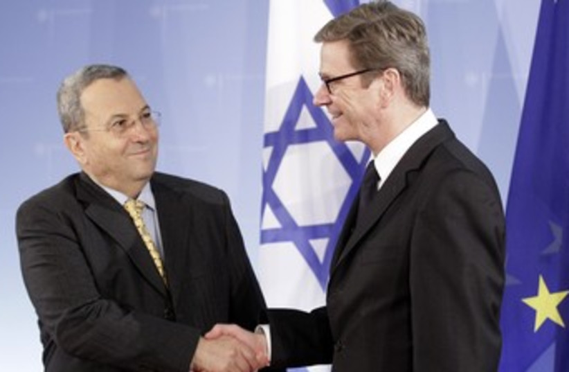 Barak shakes hands with Westerwelle 370 (photo credit: REUTERS/Tobias Schwarz)