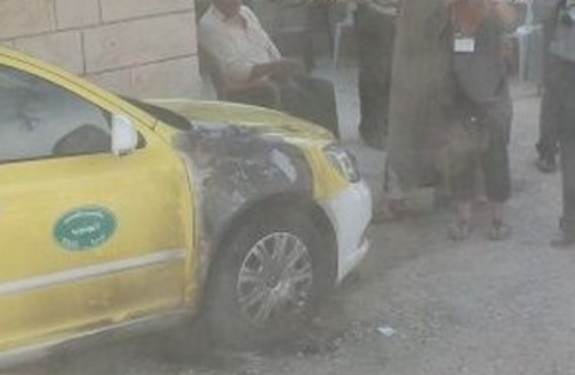 Price tag taxi burned 370 (photo credit: Courtesy Judea and Samaria Police)