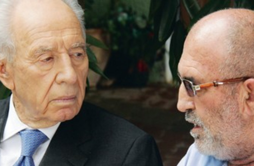 Peres with Majdi Halabi's family 370 (photo credit: Yosef Avi Yair Angel)