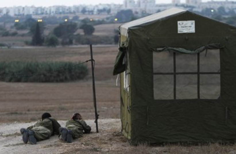 IDF soldiers at Iron Dome battery site near Ashkelon 370 (photo credit: REUTERS)