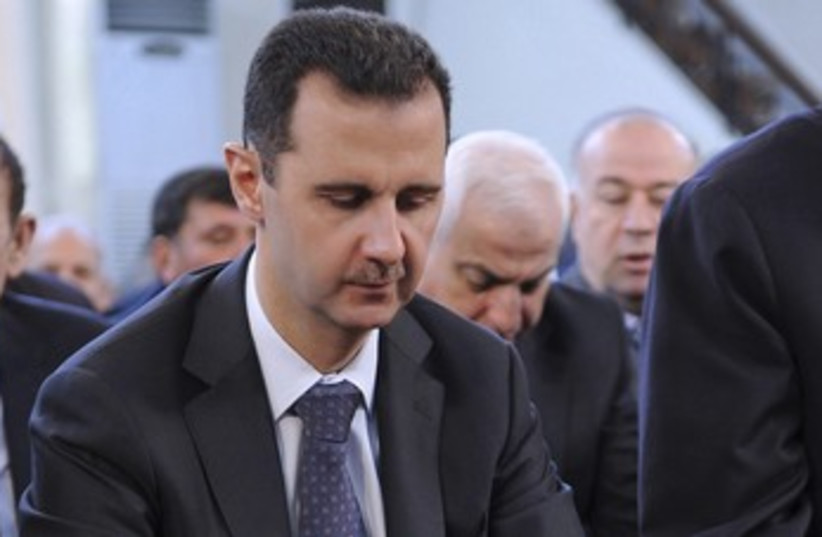 Syrian President Assad at Id al-Adha prayers 370 (photo credit: REUTERS)