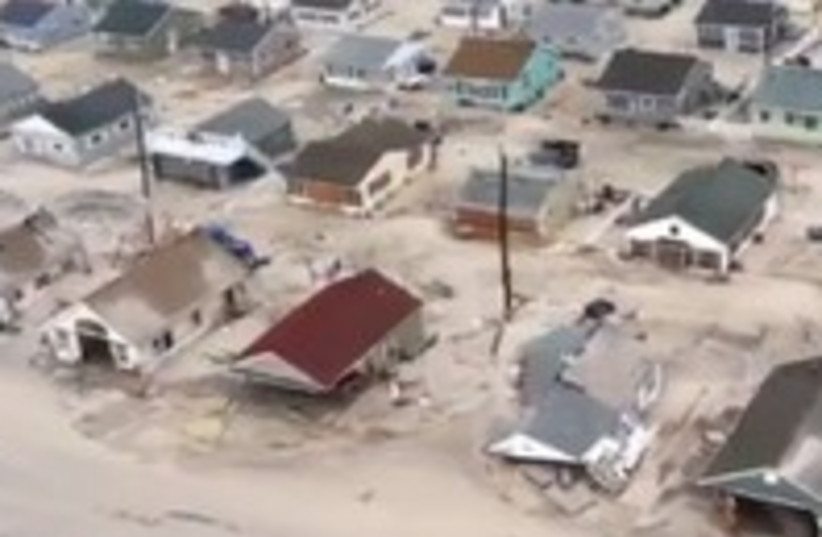 Homes destroyed by Sandy on New Jersey shore 300 (R) (photo credit: REUTERS/Handout)
