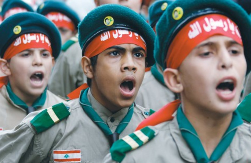 LEBANON’S HEZBOLLAH al-Mahdi boy scouts 521 (photo credit: Reuters)