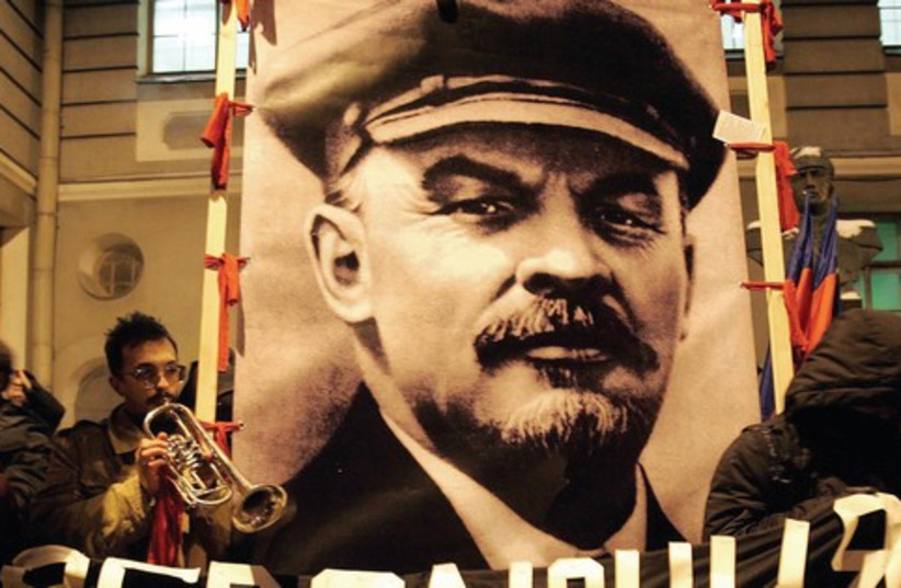 Protesters with Lenin poster 521 (photo credit: Reuters)