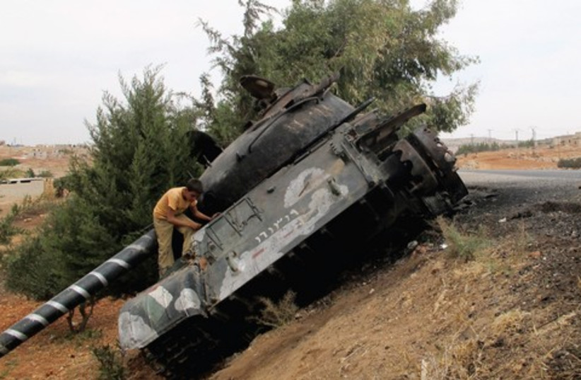 Syrian tank 521 (photo credit: ABDALGHNE KAROOF)