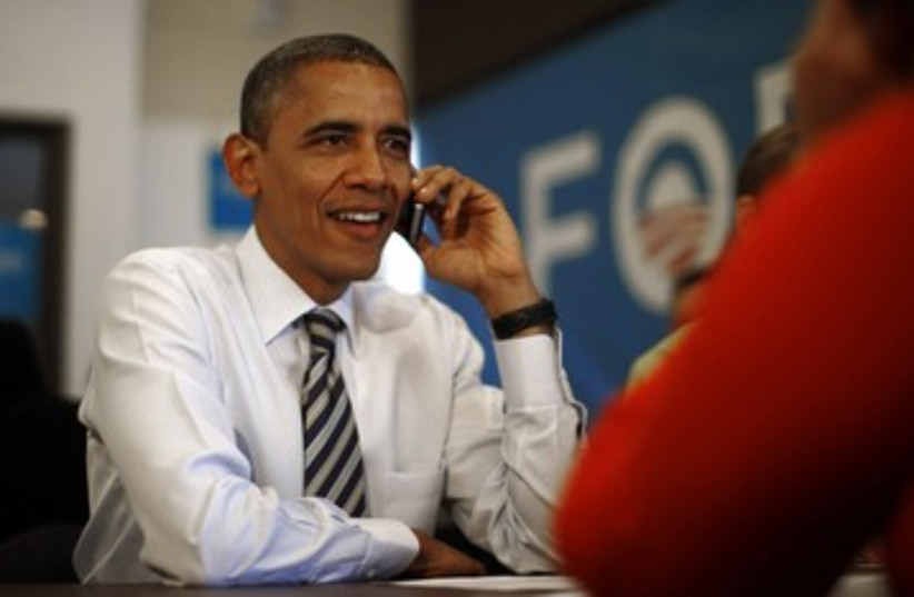 Obama talking to voters on election day.