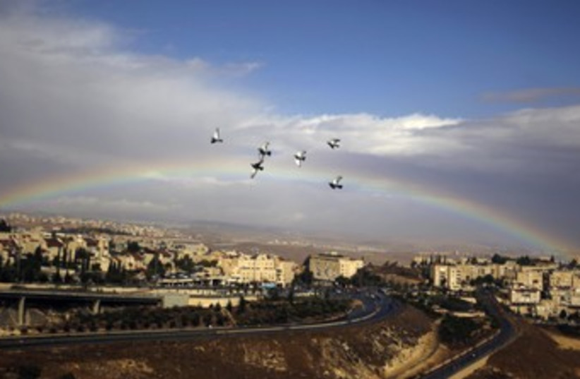 Rainbow in Jerusalem's Pisgat Ze'ev neighborhood 370 (photo credit: REUTERS/Ammar Awad)