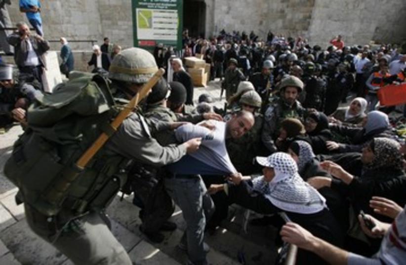 Pro Palestinian protests in Jerusalem 390 (photo credit: REUTERS/Ammar Awad)