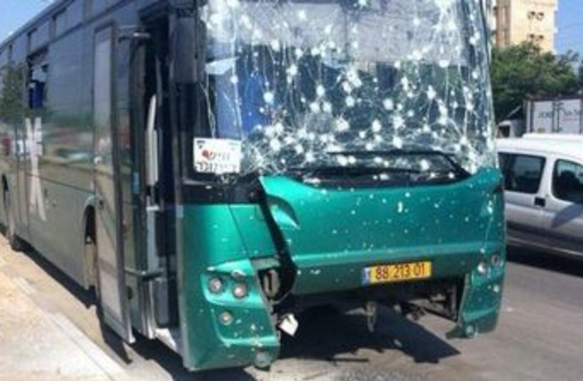 Bus damaged by rocket in Beersheba 370 (photo credit: Israel Police)
