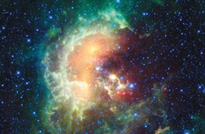 Star galaxy nebula colourful 370 (photo credit: UCLA/JPL-Caltech/NASA/Reuters)
