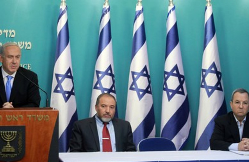 Netanyahu, Barak, Liberman press conference 390 (photo credit: Marc Israel Sellem/ The Jerusalem Post)