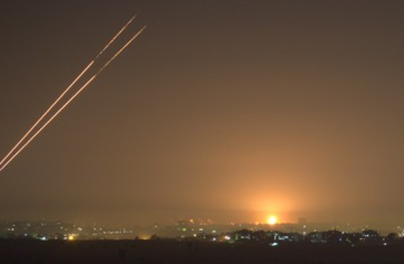 Kassam missiles and IDF bombs in Gaza ahead of cease-fire 39 (photo credit: Samuel Vengrinovich)