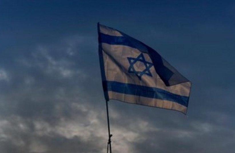 Israeli flag 370 (photo credit: REUTERS/Yannis Behrakis)