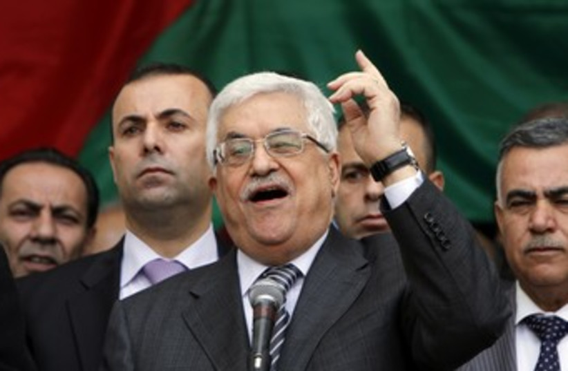 Abbas in rally for UN bid 370 (photo credit: REUTERS/Mohamad Torokman)