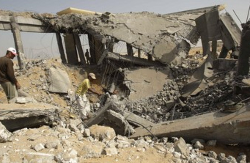 Gaza airport destruction 370 (photo credit: REUTERS/Ibraheem Abu Mustafa)