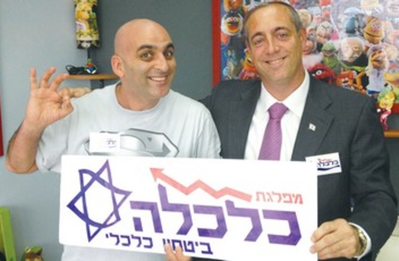 YUVAL HAMEBULBAL poses with Daniel Goldstein 370 (photo credit: Courtesy Benny Goldstein)