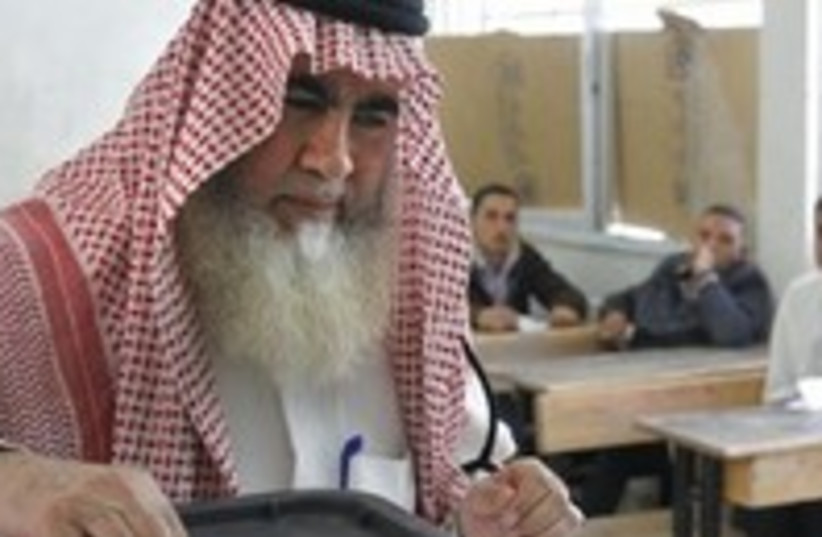 Man votes in Amman 300 (photo credit: Reuters)
