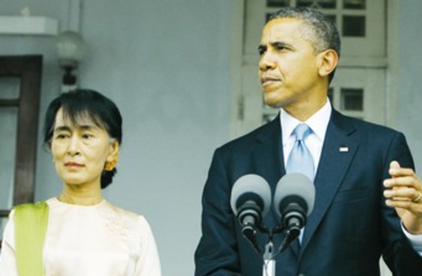 Obama with Myanmar's Opposition Leader 370 (photo credit: REUTERS)