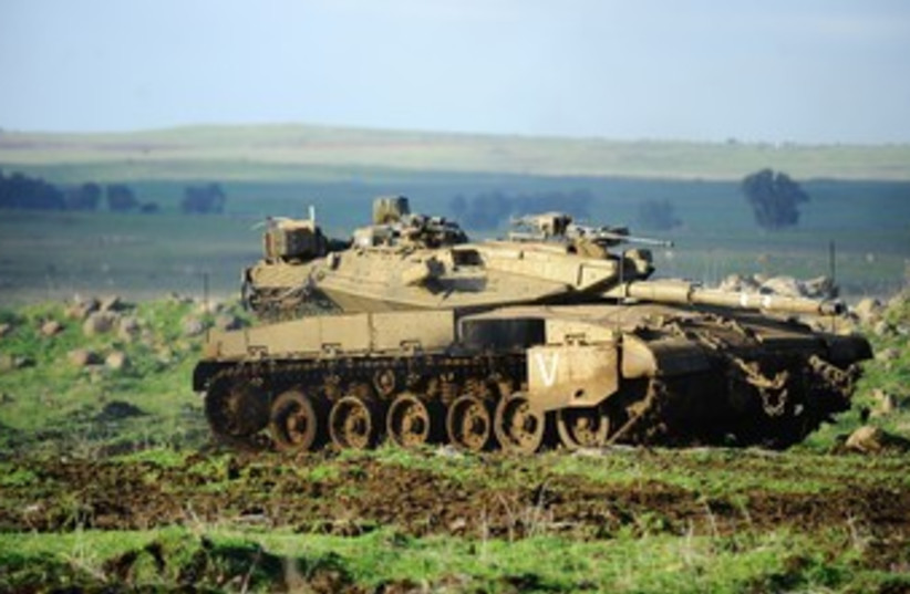 IDF tank patrols Golan Heights 370 (photo credit: IDF Spokesman Unit)