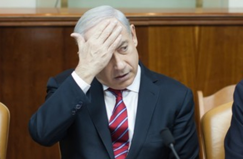 Netanyahu at weekly cabinet meeting 370 (photo credit: GPO / Emil Salman)