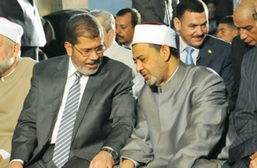 Egyptian President Morsi with Grand Sheikh El-Tayeb 370R (photo credit: Reuters)