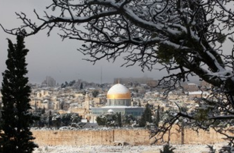 Snow-covered Dome of the Rock 370 (photo credit: Marc Israel Sellem/The Jerusalem Post)