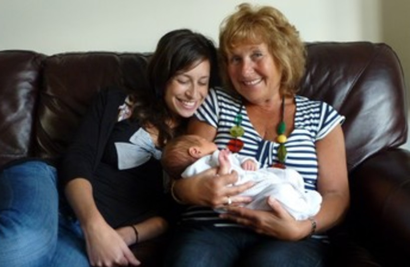 Sharon Berger with daughter Caroline and her grandchild 370 (photo credit: Courtesy Jonathan Berger)
