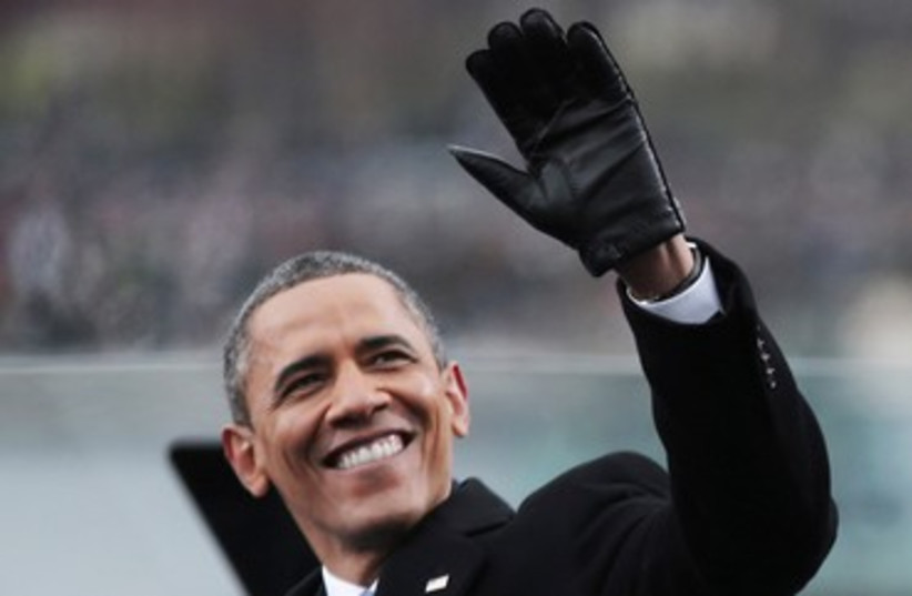 Obama waves during his second presidential inauguration 370 (photo credit: REUTERS)